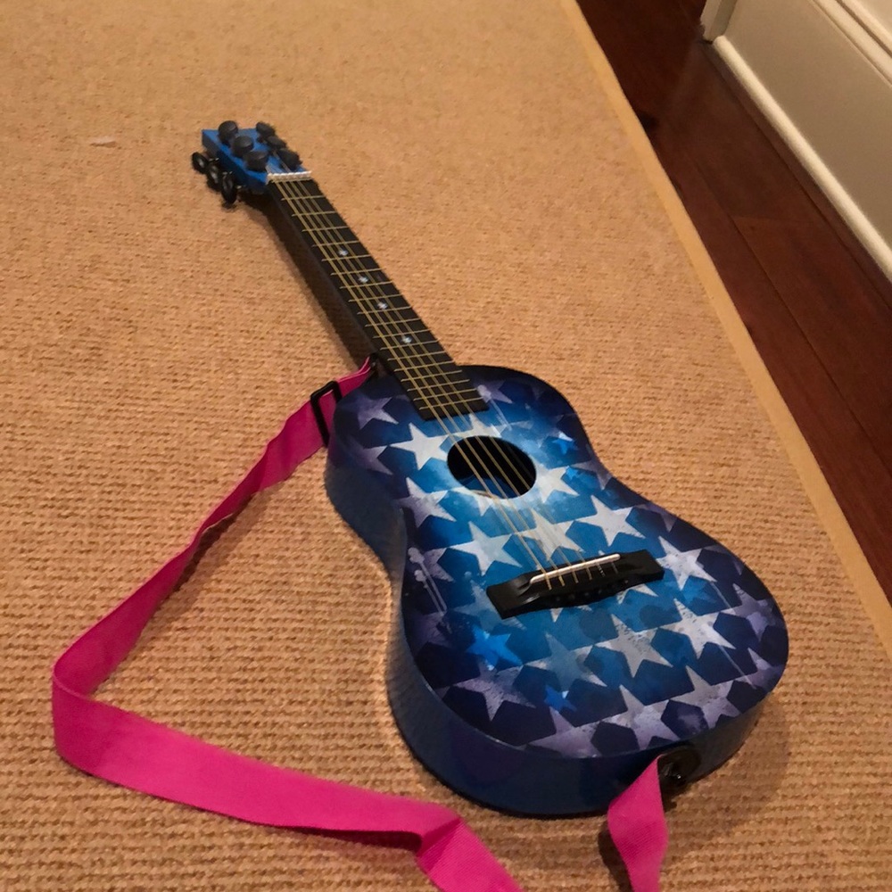 First act discovery guitar